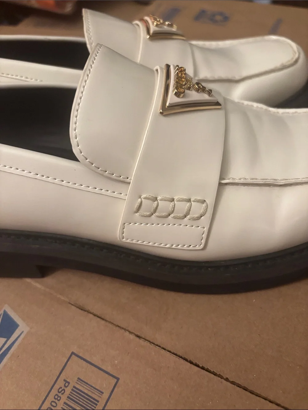 NWOT Guess White Slip-On Penny Loafers with Gold Triangle Logo